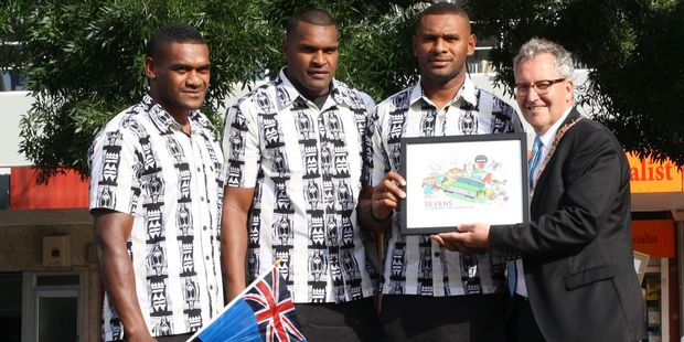 Members of the Fiji sevens team who went on to win the tournament, receive a gift from Hamilton Mayor Andrew King during the civic welcome in Garden Place on Friday. Photo / Peter Tiffany