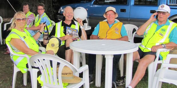 Lions club members take a breather between jobs at the Avocado Food and Wine Festival. Photo / Supplied