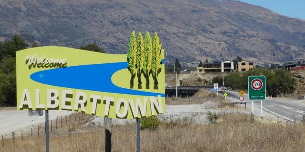 The sign on State Highway 6, north of the Clutha River.