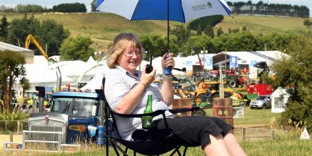 Secretary-event manager Sharon Paterson directs proceedings as stall holders prepare for the Southern Field Days at Waimumu. Photo / Stephen Jaquiery