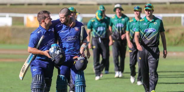 Auckland Aces captain Craig Cachopa (left) and Robbie O'Donnell celebrate as CD Stags take back seat at Pukekura Park, New Plymouth, today. Photo/Photosport