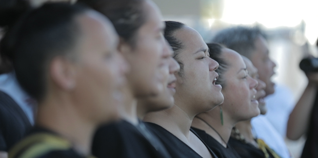 Ngāti Whātua Orākei representatives perform a waita at the opening of the Volvo Ocean Race village, Viaduct Basin. Photo / Michael Craig