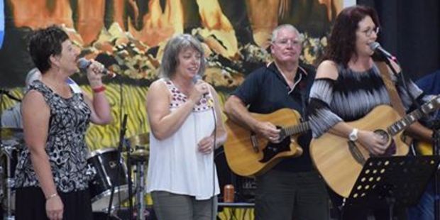 Performers Kay Tappin and Jocelyn Tuahine got up on stage with Australian yodeller Jocelyn Downing during the Taranaki Country Music Festival.