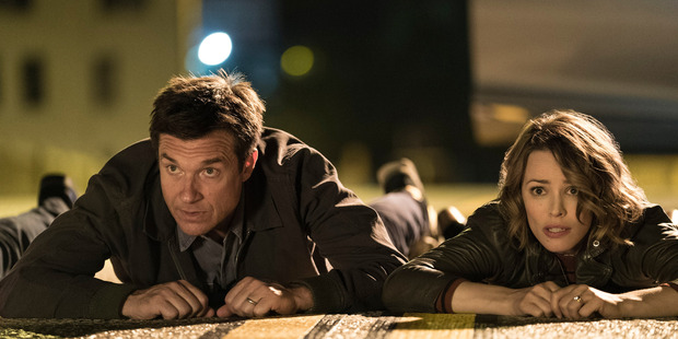 Rachel McAdams and Jason Bateman in a scene from Game Night.