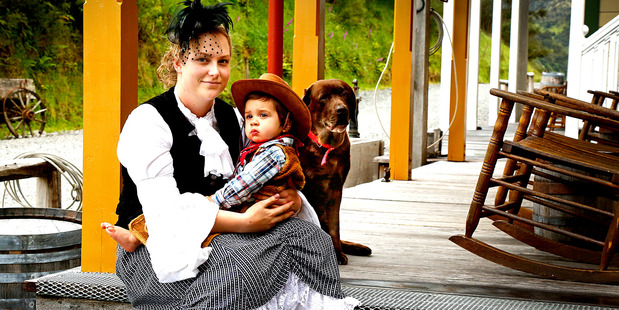 Miss Belle - Isabel May with Chico and Halle outside the Lucky Strike Saloon.
Photo/ Bevan Conley